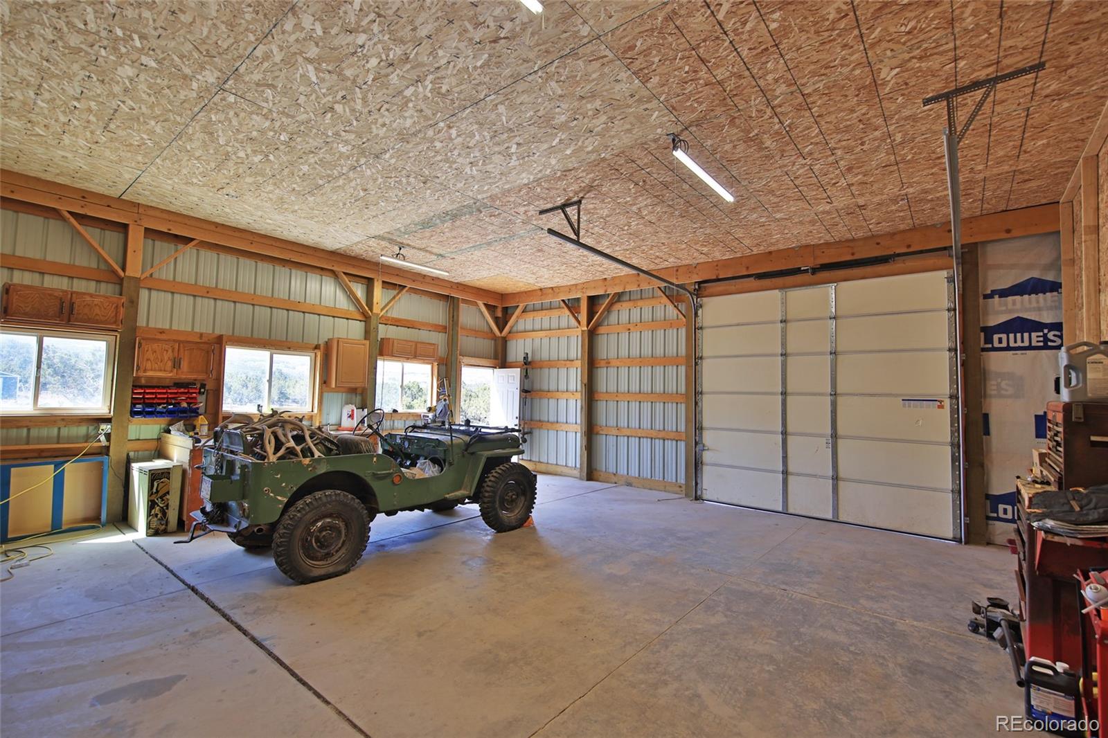 56001 Kk (1 Parcel) Road Molina, CO 81646 - Photo 23 of 43 a view of a car garage