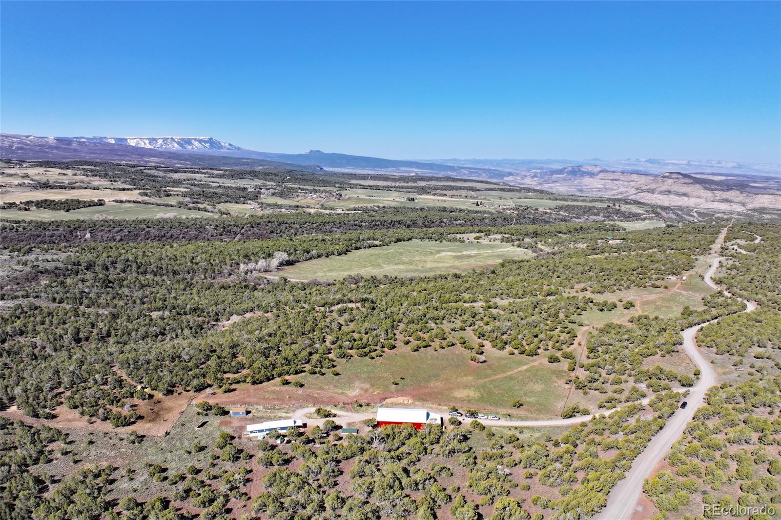 56001 Kk (1 Parcel) Road Molina, CO 81646 - Photo 30 of 43 a view of a lot of mountains and valleys