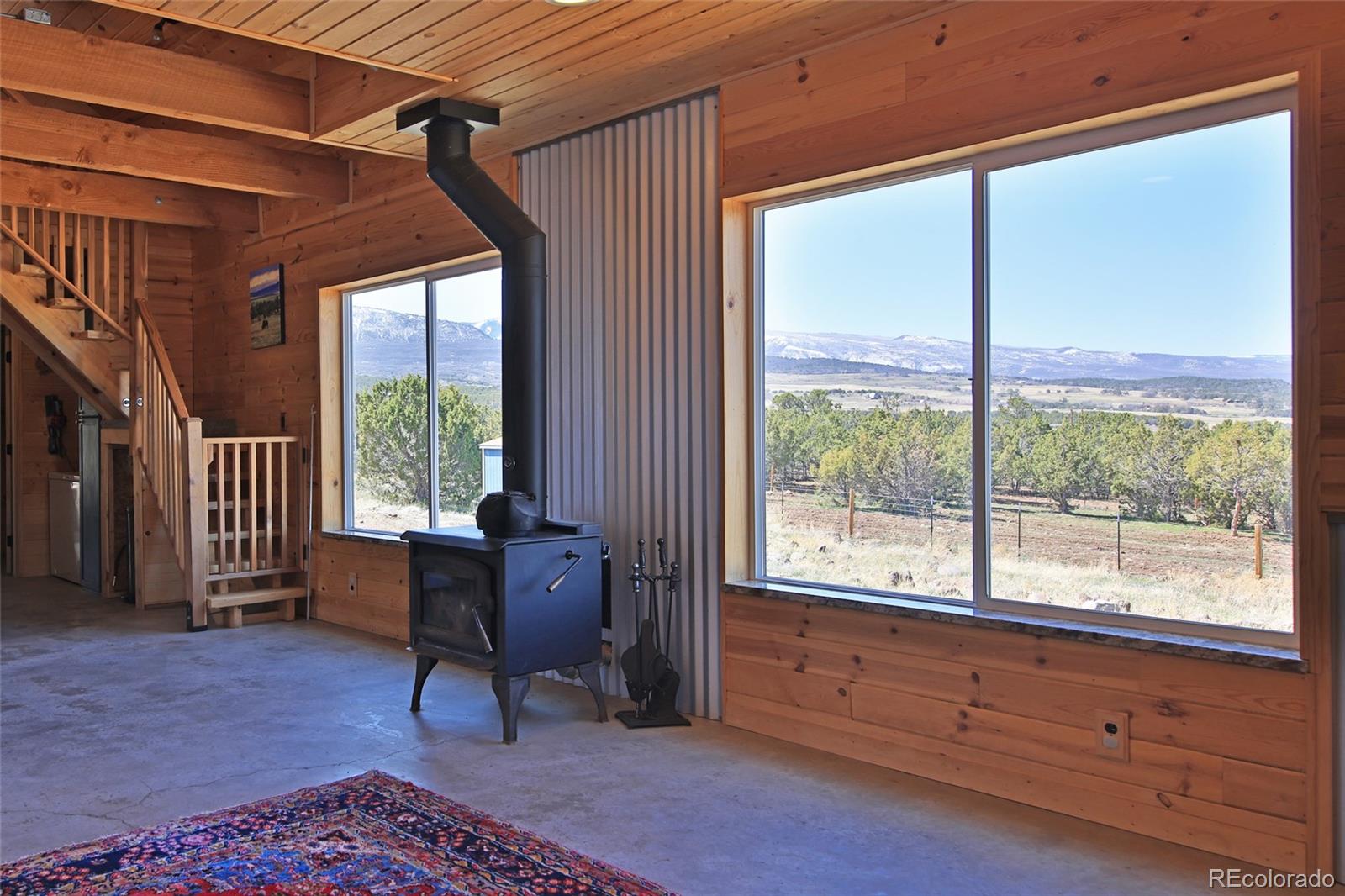 56001 Kk (1 Parcel) Road Molina, CO 81646 - Photo 8 of 43 a living room with furniture and a window