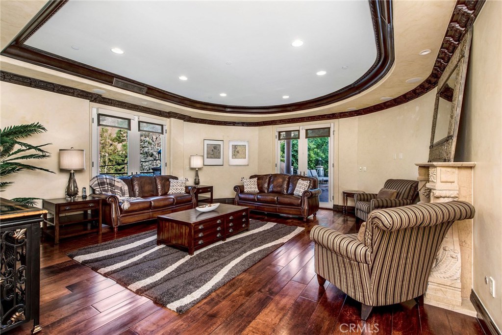 1441 Robmar Drive Beverly Hills, CA 90210 - Photo 12 of 42 a living room with furniture and a large window
