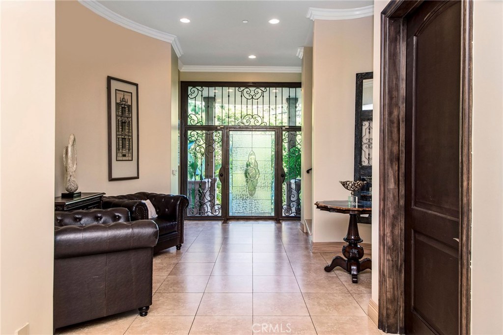 1441 Robmar Drive Beverly Hills, CA 90210 - Photo 13 of 42 a living room with furniture and a large window