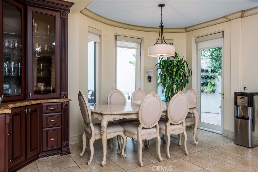 1441 Robmar Drive Beverly Hills, CA 90210 - Photo 27 of 42 a dining room with furniture window and outside view