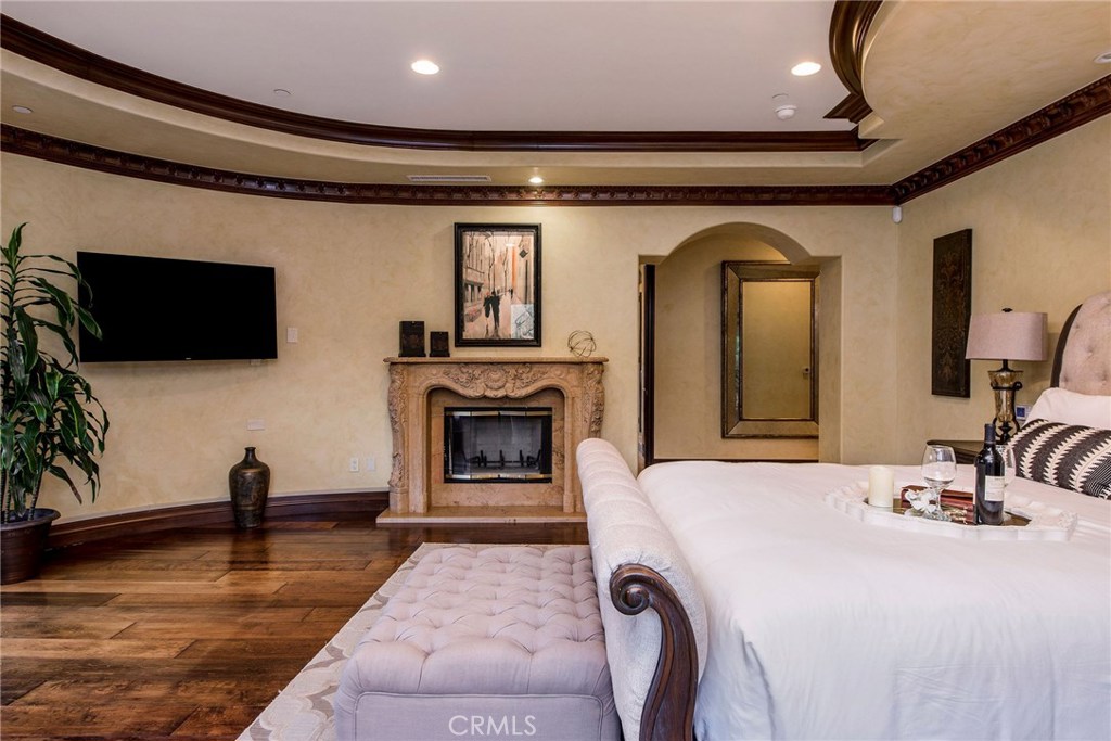 1441 Robmar Drive Beverly Hills, CA 90210 - Photo 36 of 42 a living room with fireplace furniture and a flat screen tv