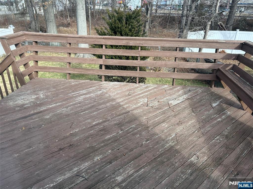 47 Ryle Avenue Little Falls, NJ 07424 - Photo 16 of 18 a view of a room with racks on the wall