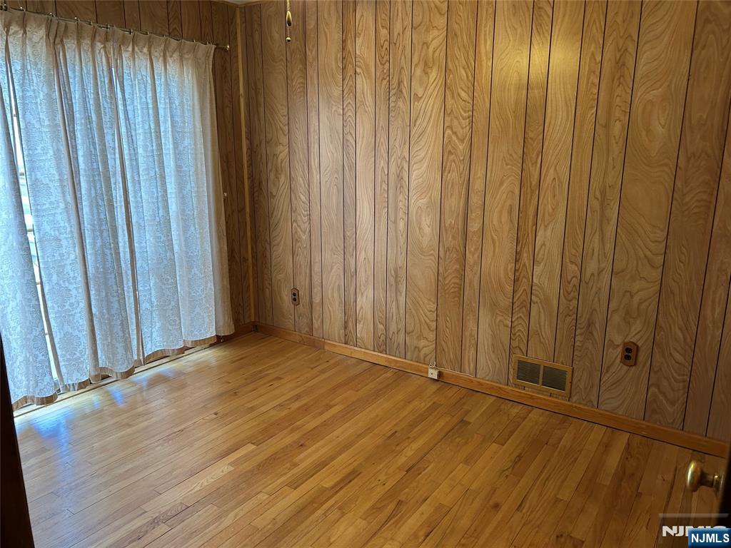 47 Ryle Avenue Little Falls, NJ 07424 - Photo 9 of 18 a view of a room with wooden walls