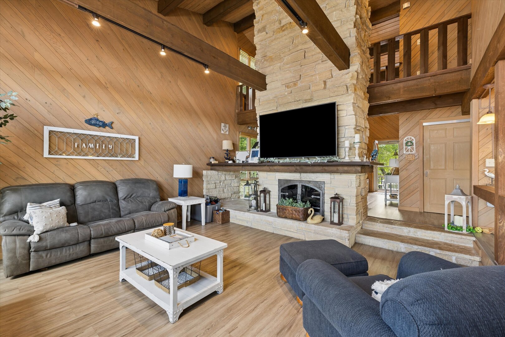 14839 Vans Road Fulton, IL 61252 - Photo 11 of 70 a living room with fireplace furniture and a flat screen tv