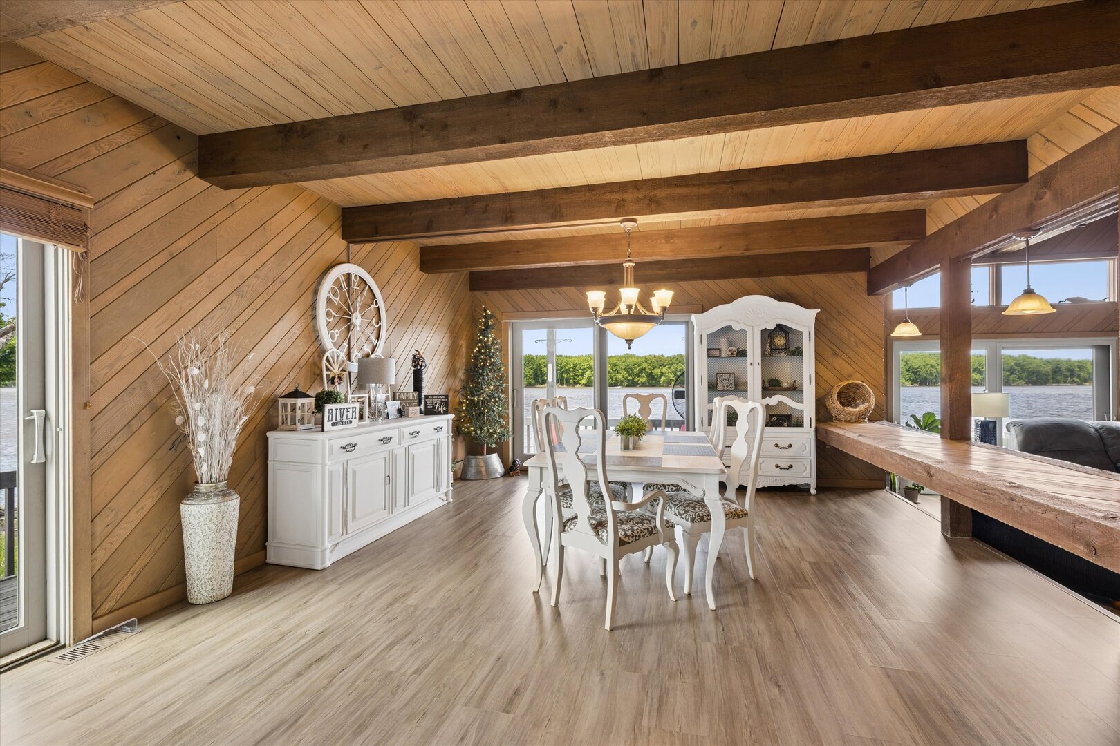 14839 Vans Road Fulton, IL 61252 - Photo 18 of 70 a view of a dining room with furniture window and wooden floor