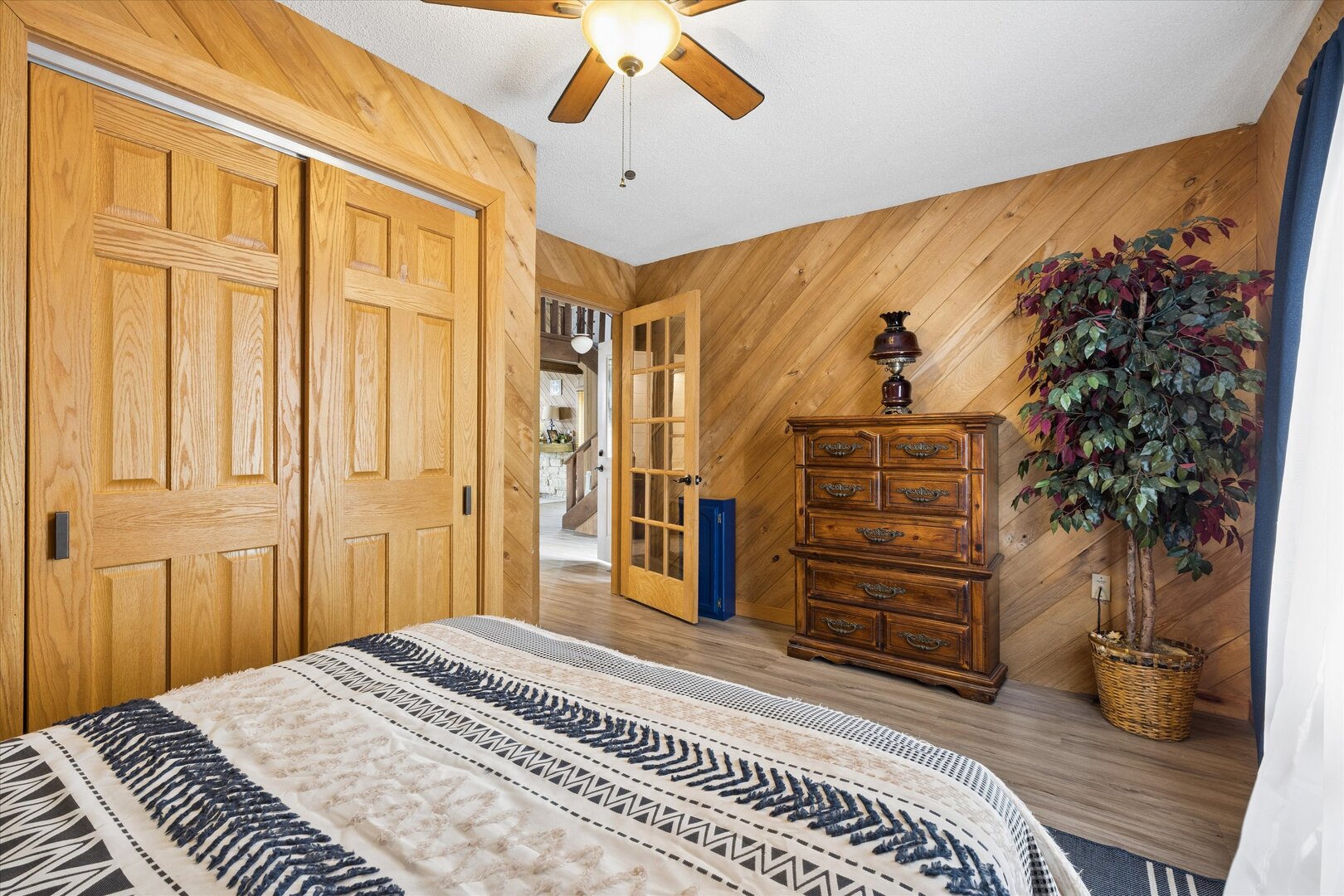 14839 Vans Road Fulton, IL 61252 - Photo 26 of 70 a bedroom with a bed and a dresser