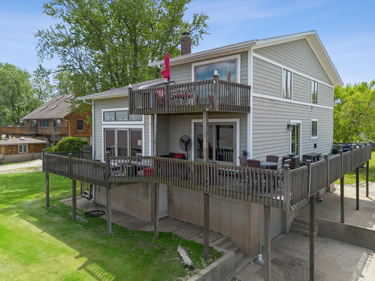 14839 Vans Road Fulton, IL 61252 - Photo 3 of 70 a view of house with a deck and a garden