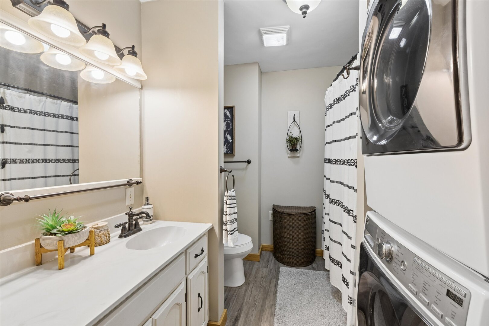 14839 Vans Road Fulton, IL 61252 - Photo 32 of 70 a bathroom with a sink a toilet and shower