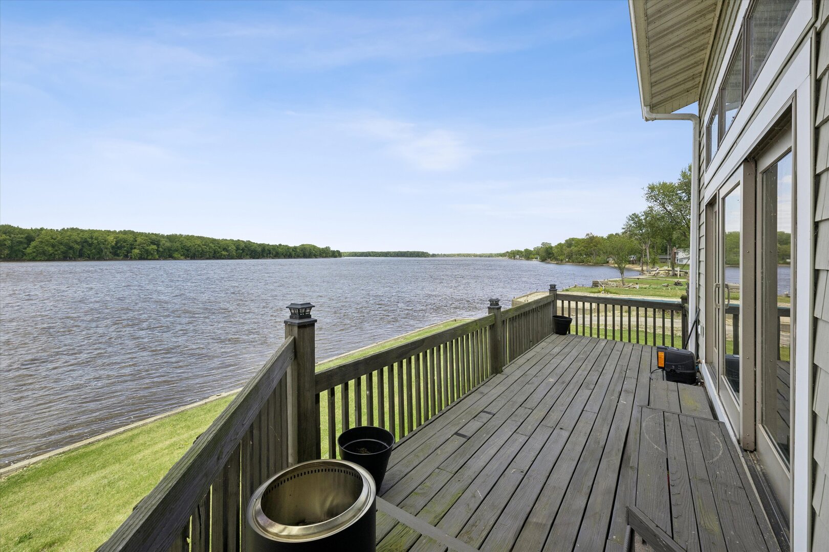14839 Vans Road Fulton, IL 61252 - Photo 36 of 70 a balcony with wooden floor and fence