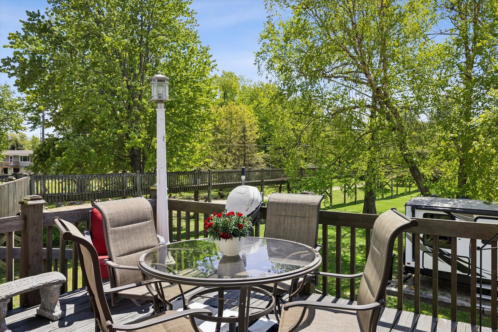 14839 Vans Road Fulton, IL 61252 - Photo 40 of 70 a table and chairs with the view of tree