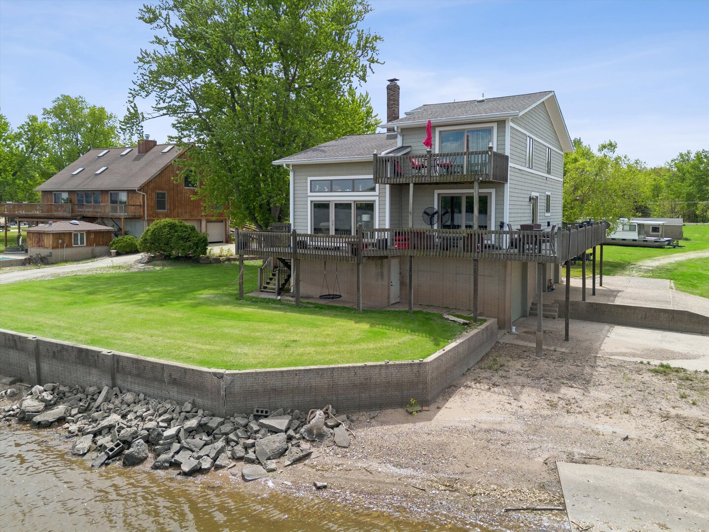 14839 Vans Road Fulton, IL 61252 - Photo 5 of 70 a view of a house with a yard patio and sitting area