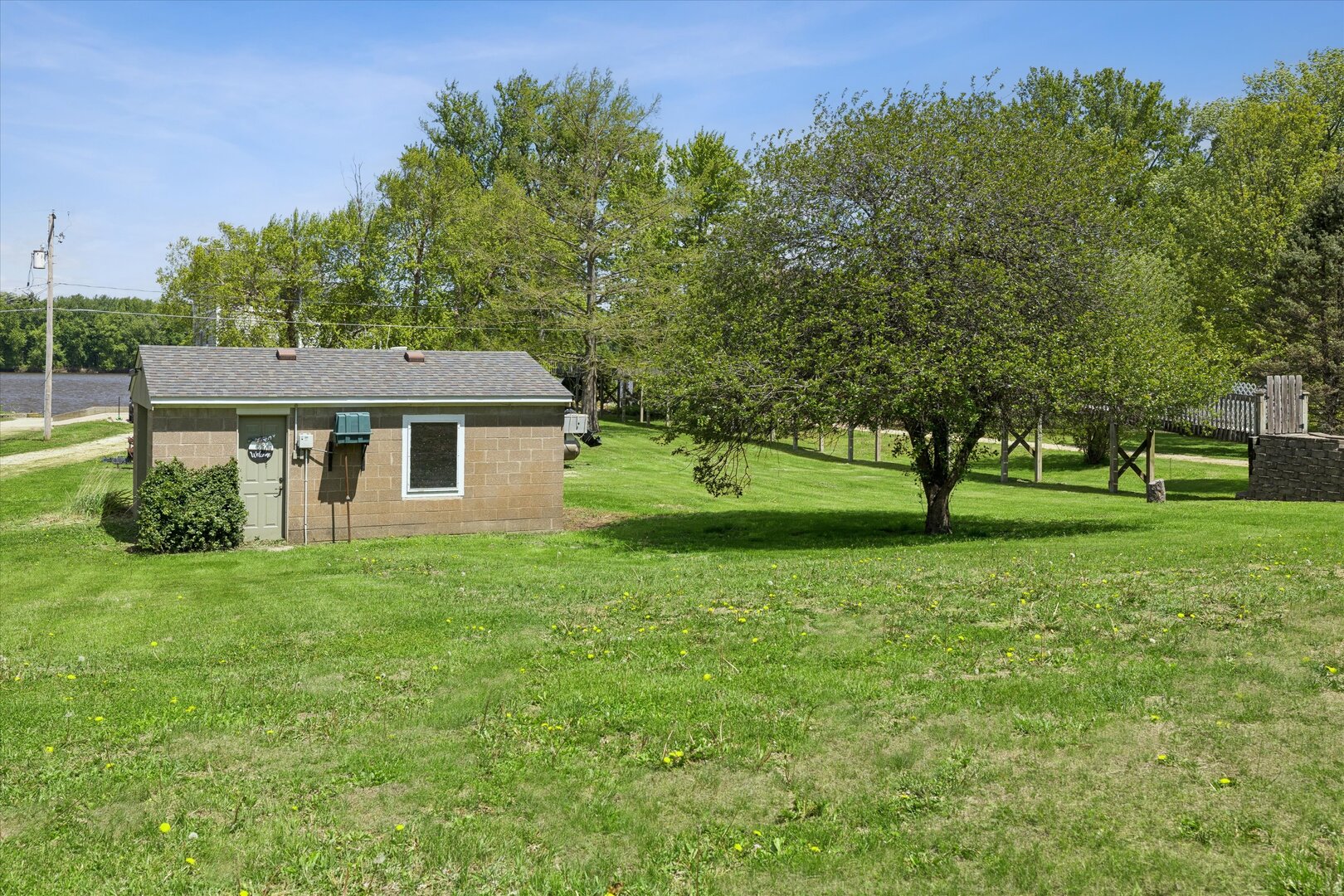 14839 Vans Road Fulton, IL 61252 - Photo 61 of 70 a view of a house with a backyard