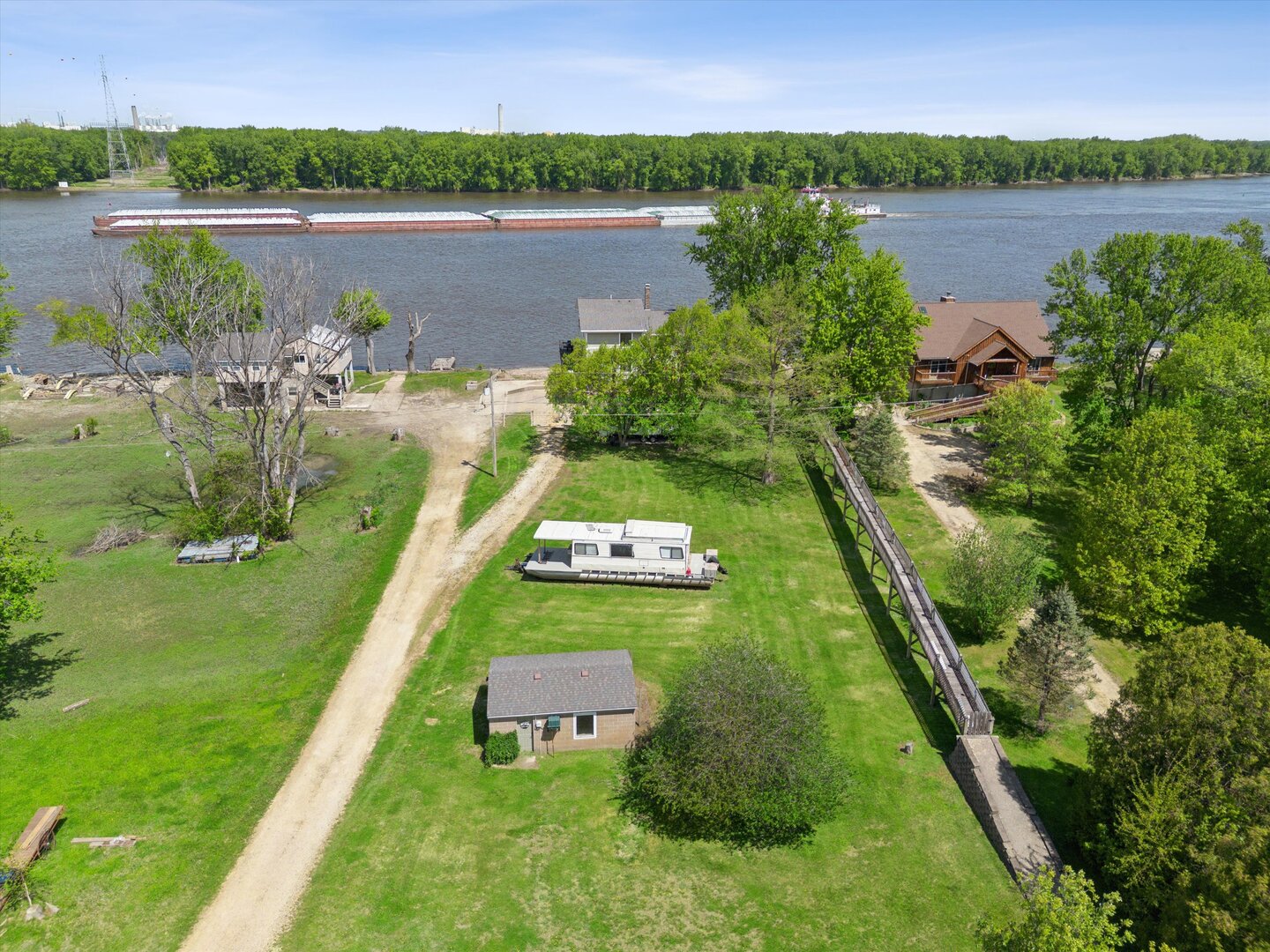 14839 Vans Road Fulton, IL 61252 - Photo 64 of 70 a view of a lake with a yard