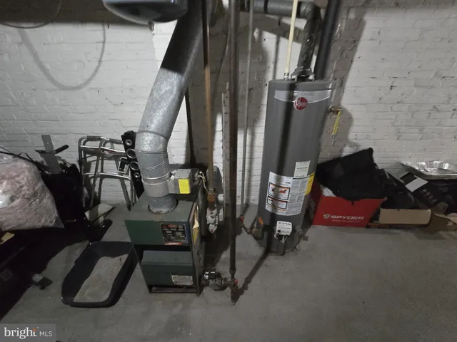 a view of living room with furniture and a fireplace