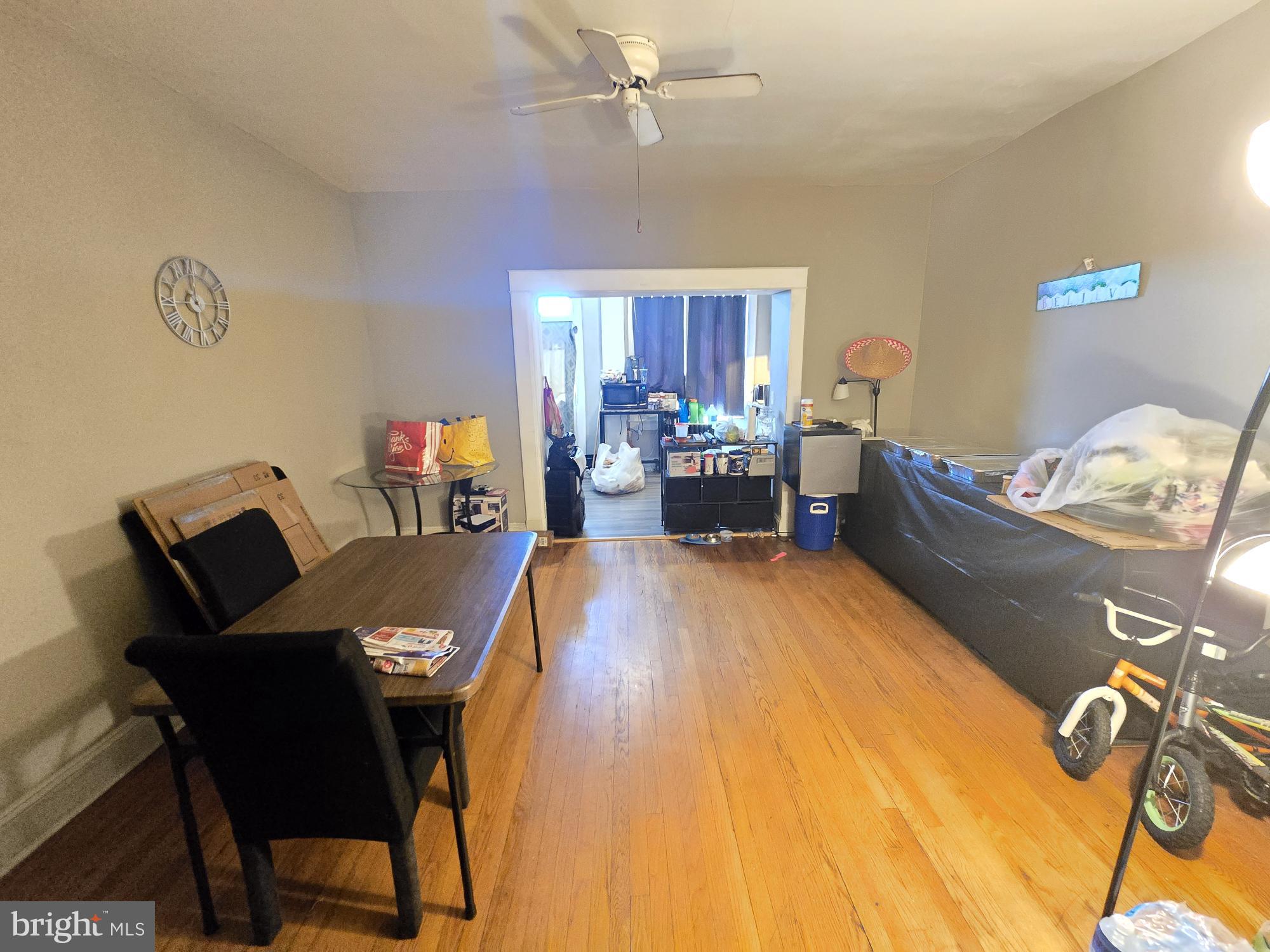 2809 Washington Boulevard Baltimore, MD 21230 - Photo 2 of 21 a living room with furniture and a table