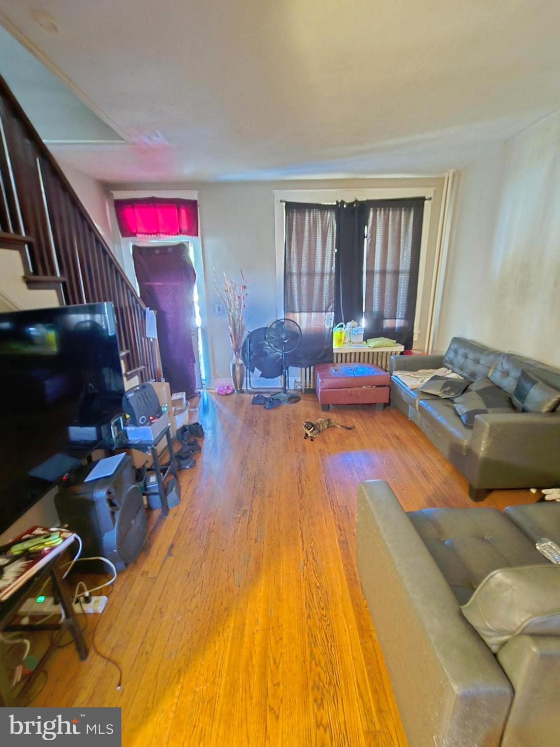 2809 Washington Boulevard Baltimore, MD 21230 - Photo 4 of 21 a bedroom with a bed and a window