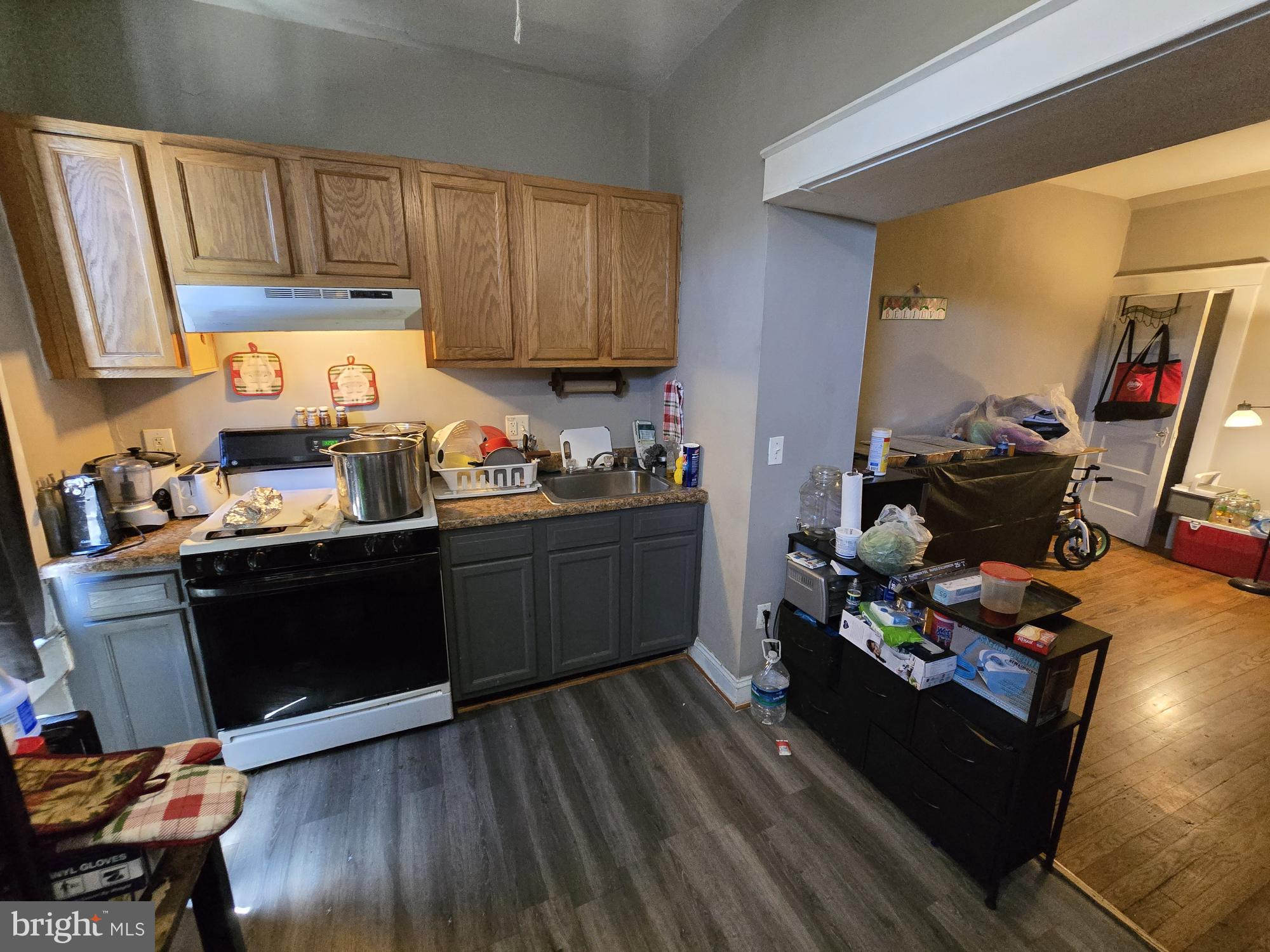 2809 Washington Boulevard Baltimore, MD 21230 - Photo 6 of 21 a kitchen with a sink appliances and cabinets