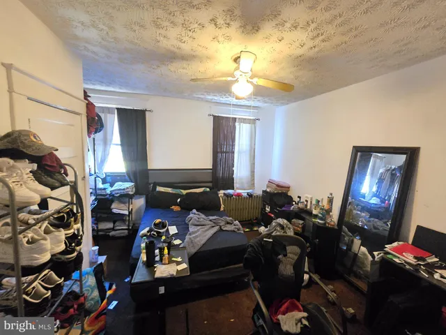 a outdoor living space with furniture and rug