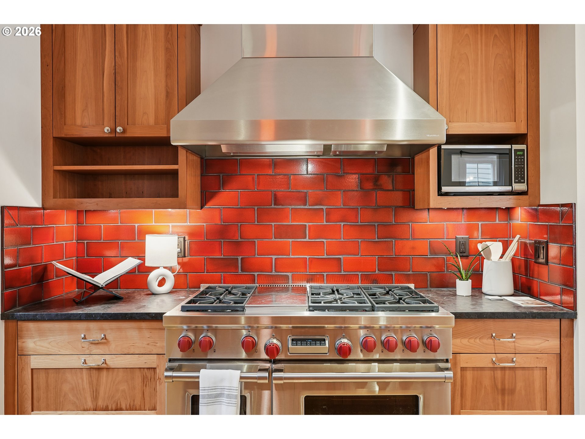 2715 Northeast 38th Avenue Portland, OR 97212 - Photo 23 of 45 a stove top oven sitting inside of a kitchen