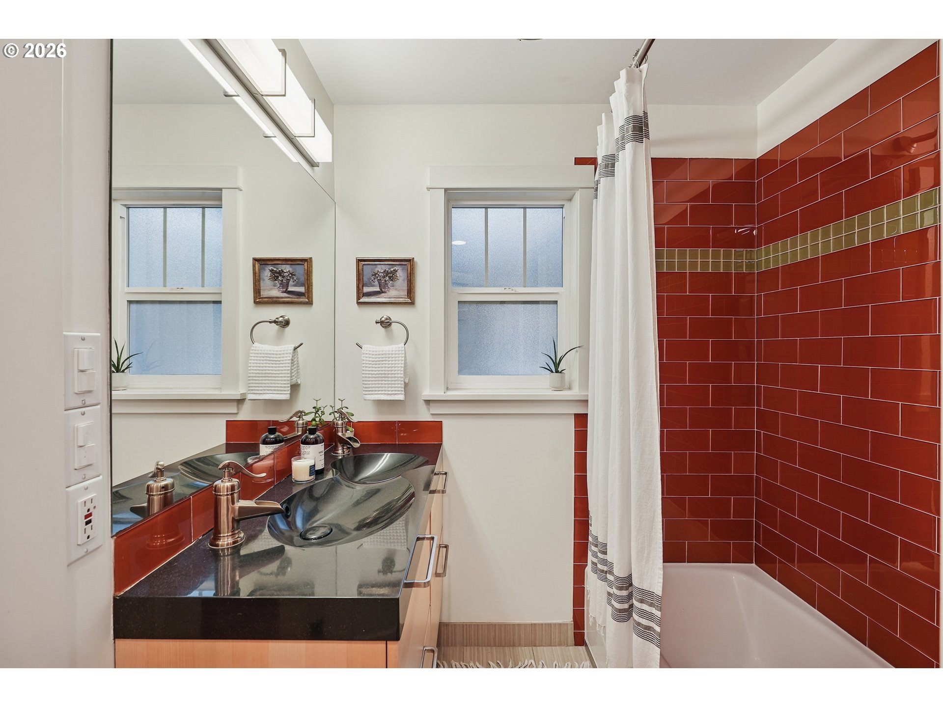 2715 Northeast 38th Avenue Portland, OR 97212 - Photo 30 of 45 a bathroom with a sink and a mirror