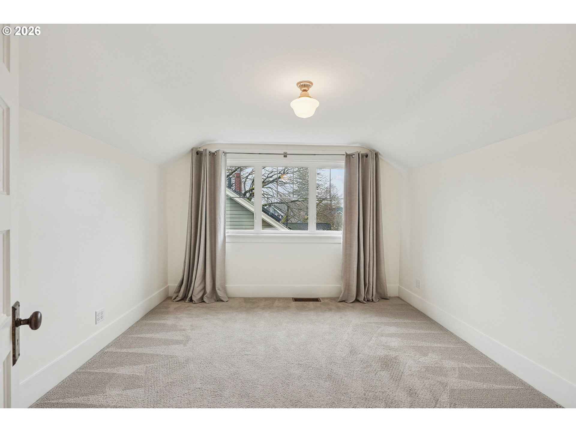 2715 Northeast 38th Avenue Portland, OR 97212 - Photo 33 of 45 a view of a room with wooden floor and windows