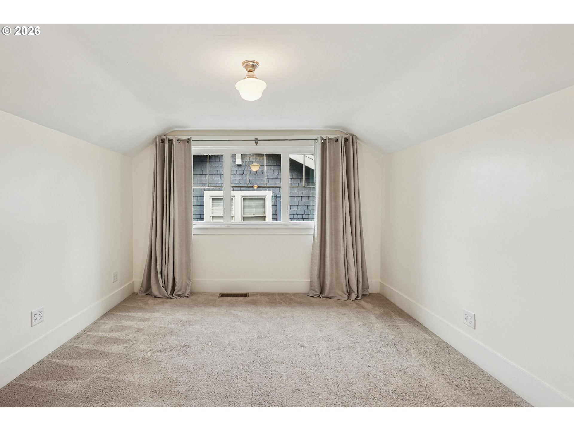 2715 Northeast 38th Avenue Portland, OR 97212 - Photo 34 of 45 an empty room with wooden floor and windows