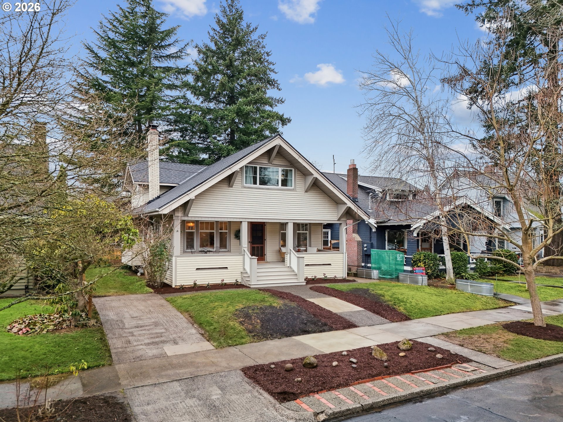 2715 Northeast 38th Avenue Portland, OR 97212 - Photo 4 of 45 a front view of a house with a yard