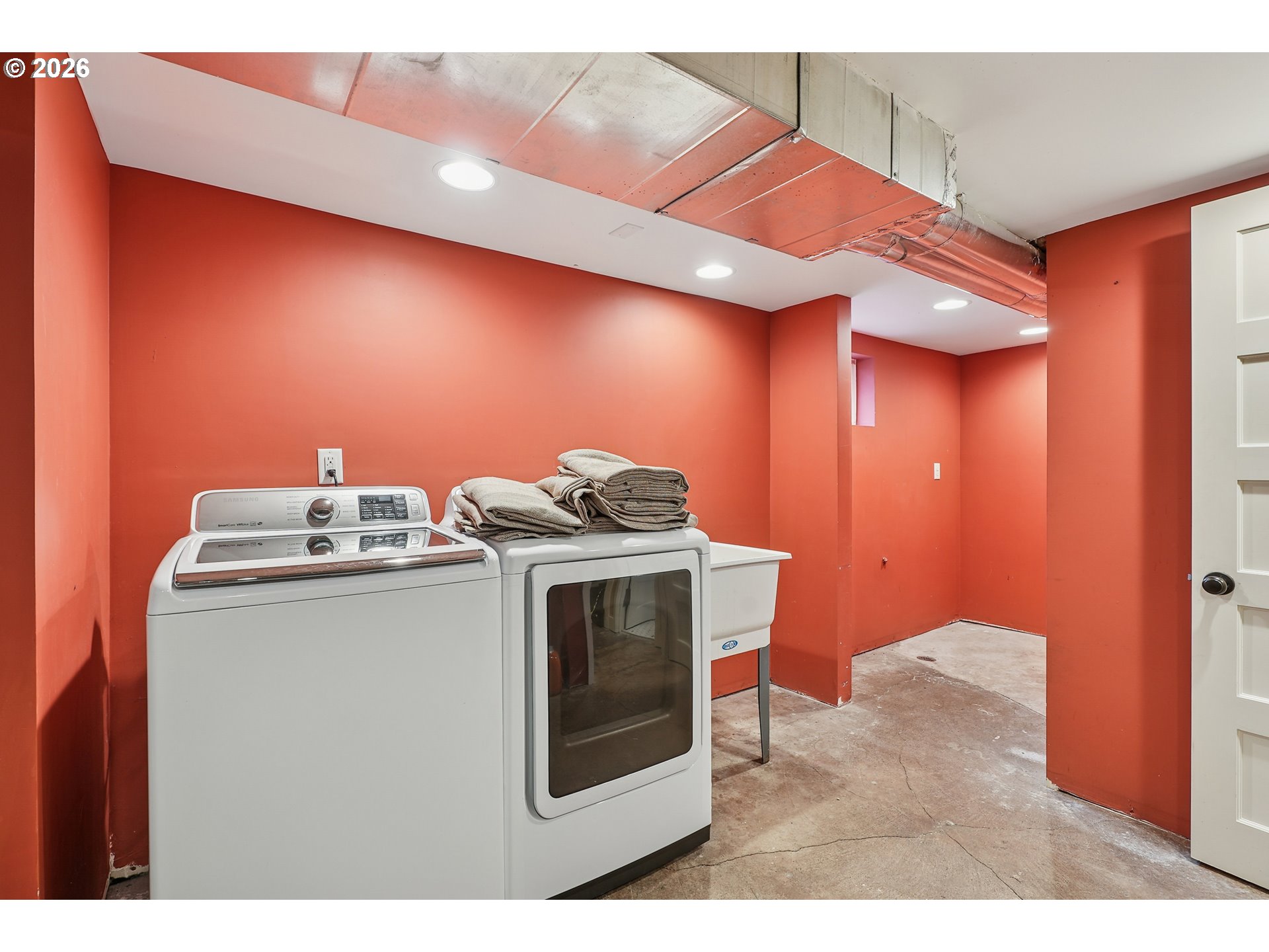 2715 Northeast 38th Avenue Portland, OR 97212 - Photo 42 of 45 a utility room with a stove and a microwave