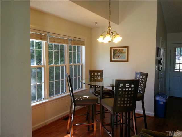 2200 Dahlgreen Road Raleigh, NC 27615 - Photo 3 of 17 The Dining Area boasts large windows, while still maintaining privacy. It is open to both the kitchen and the living room.