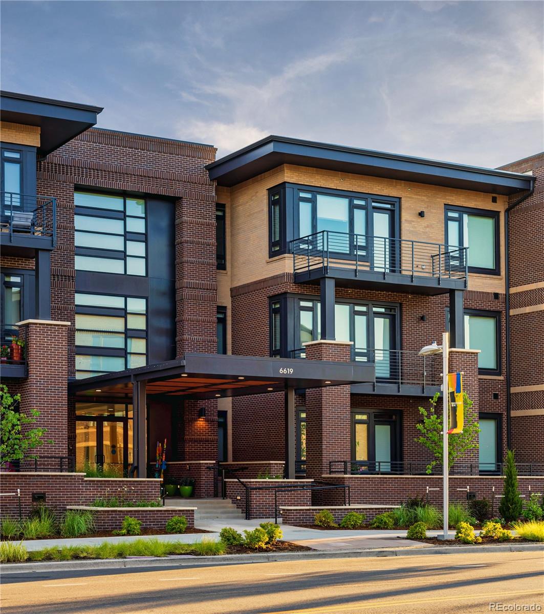 6618 East Lowry Boulevard, Unit 307 Denver, CO 80230 - Photo 1 of 23 a front view of residential houses