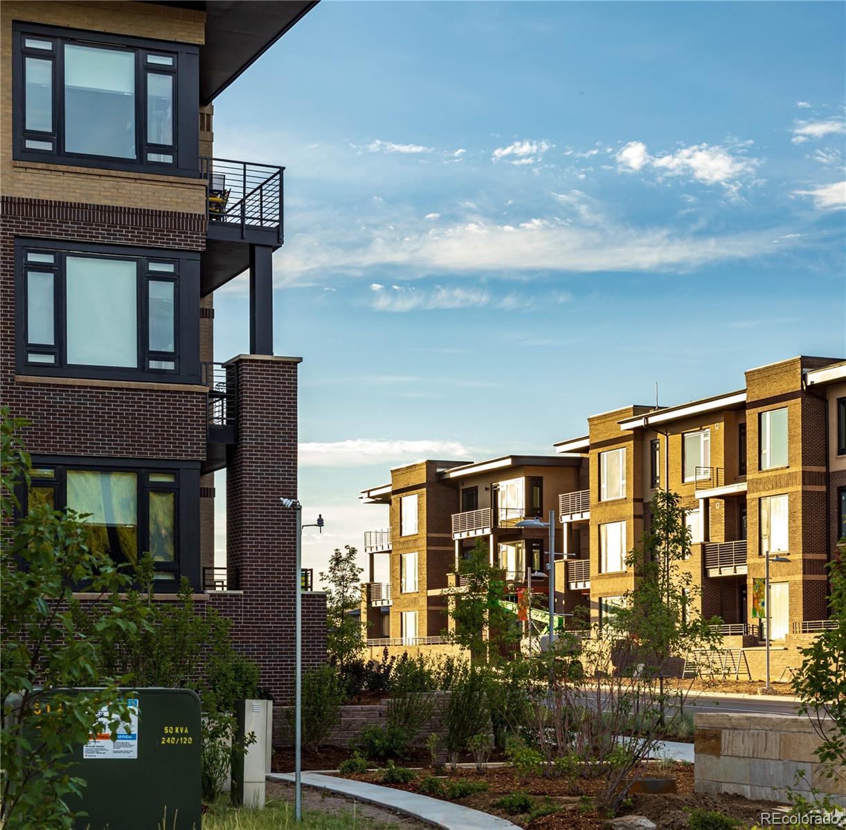 6618 East Lowry Boulevard, Unit 307 Denver, CO 80230 - Photo 22 of 23 a front view of a building with street view