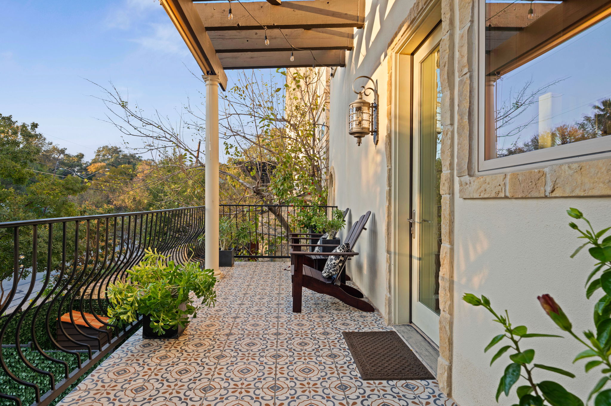 1231 Parkway, Unit 2 Austin, TX 78703 - Photo 15 of 40 a view of a balcony with chairs