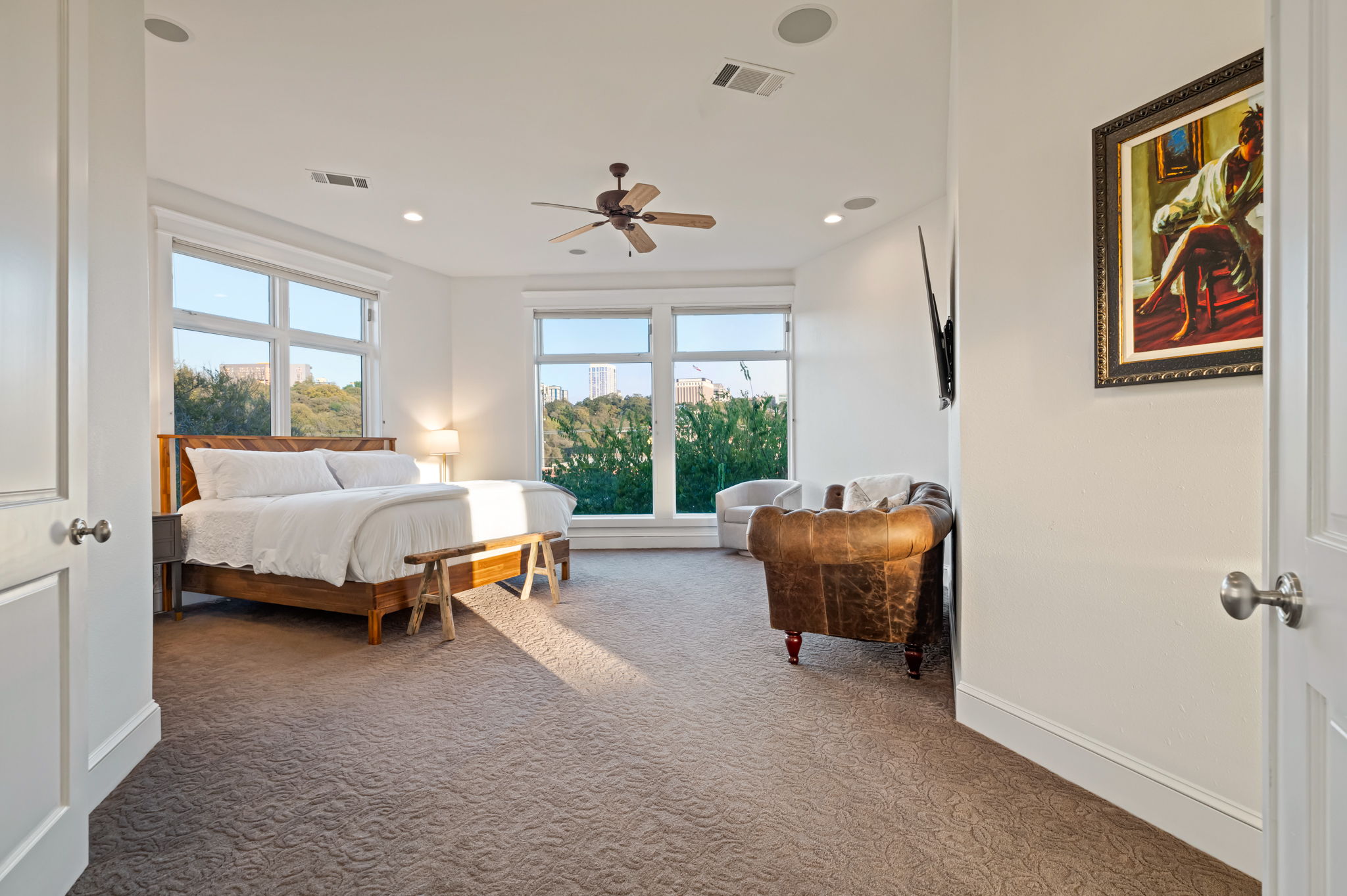 1231 Parkway, Unit 2 Austin, TX 78703 - Photo 22 of 40 a bedroom with a bed and a couch