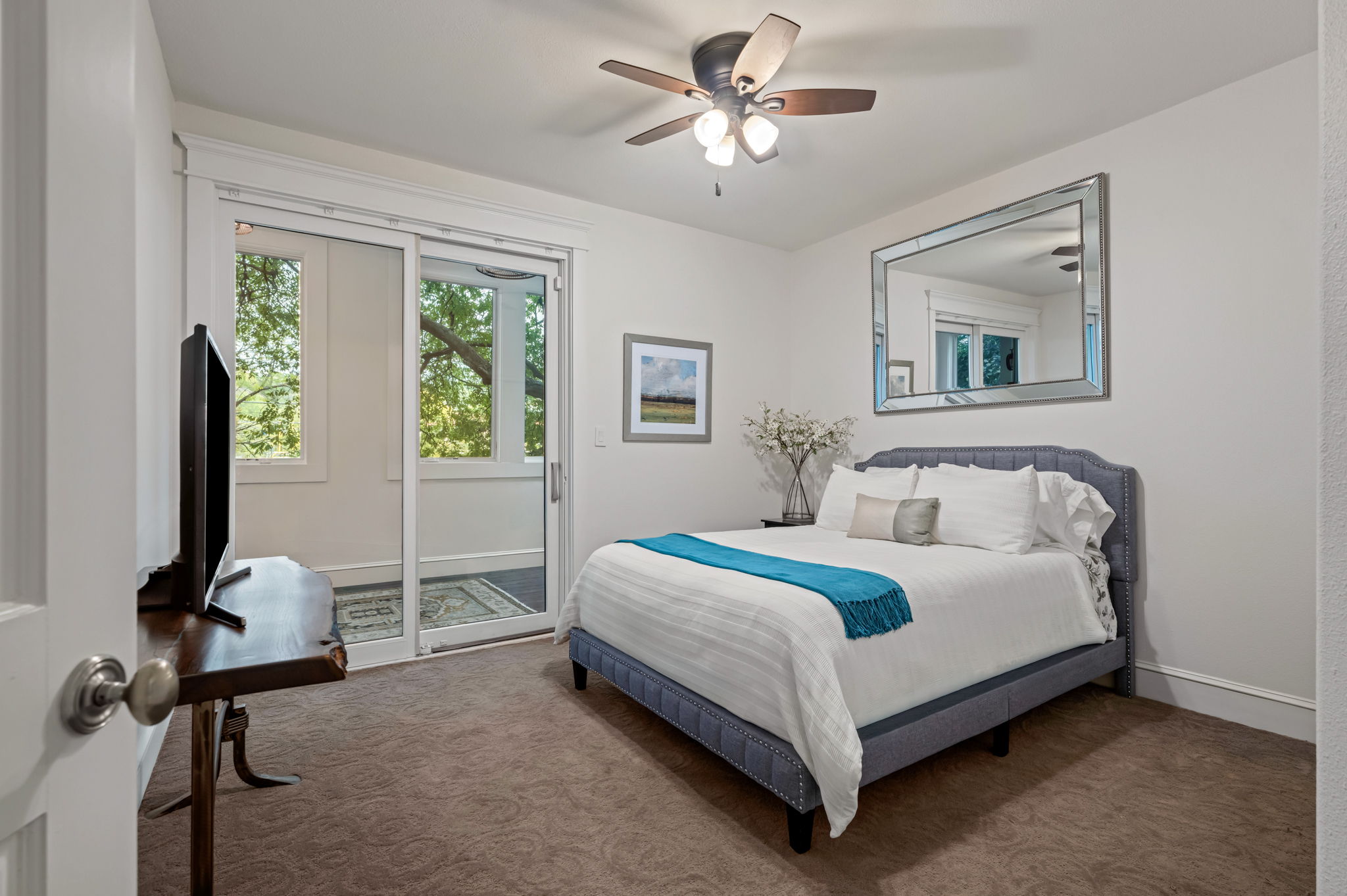 1231 Parkway, Unit 2 Austin, TX 78703 - Photo 29 of 40 a bedroom with a bed and a window