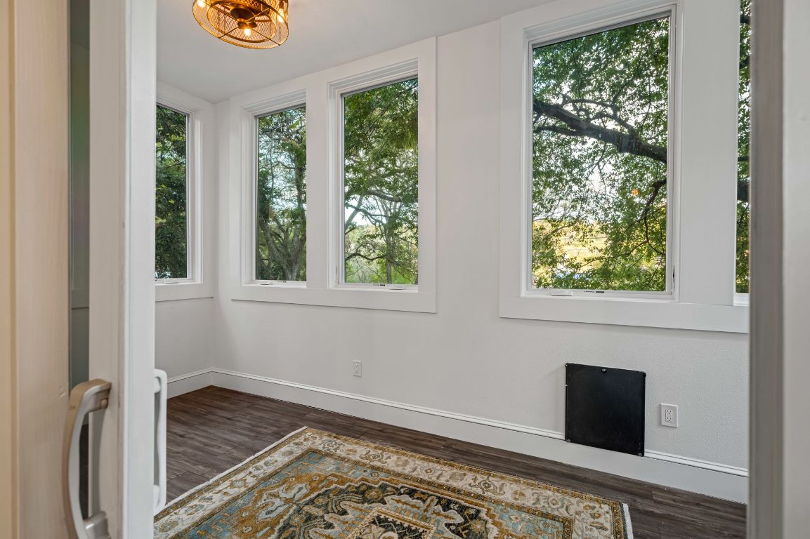 1231 Parkway, Unit 2 Austin, TX 78703 - Photo 31 of 40 Light and bright Flex room on first floor is versatile and overlooks the large backyard