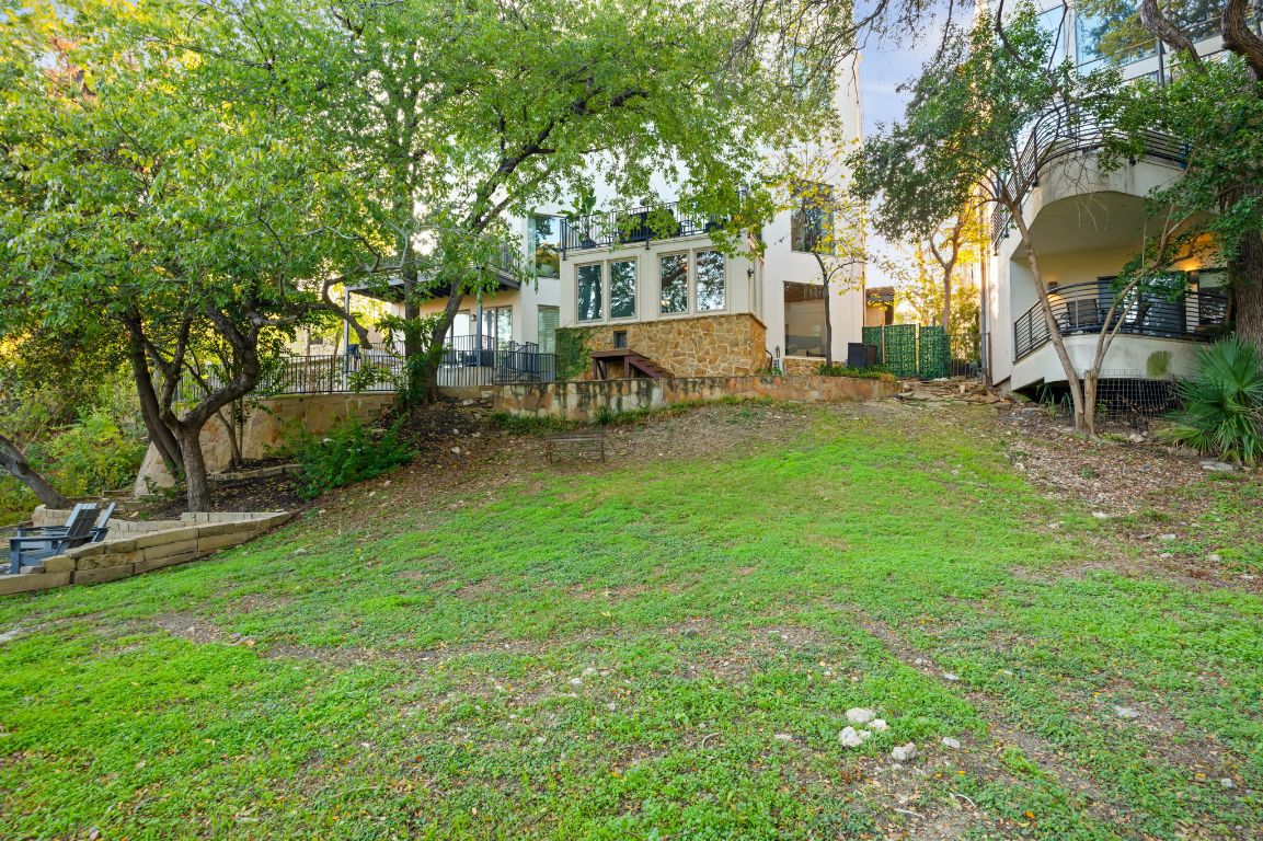 1231 Parkway, Unit 2 Austin, TX 78703 - Photo 34 of 40 Currently a low maintenance natural haven leading to the creek, but a custom landscape could transform the space