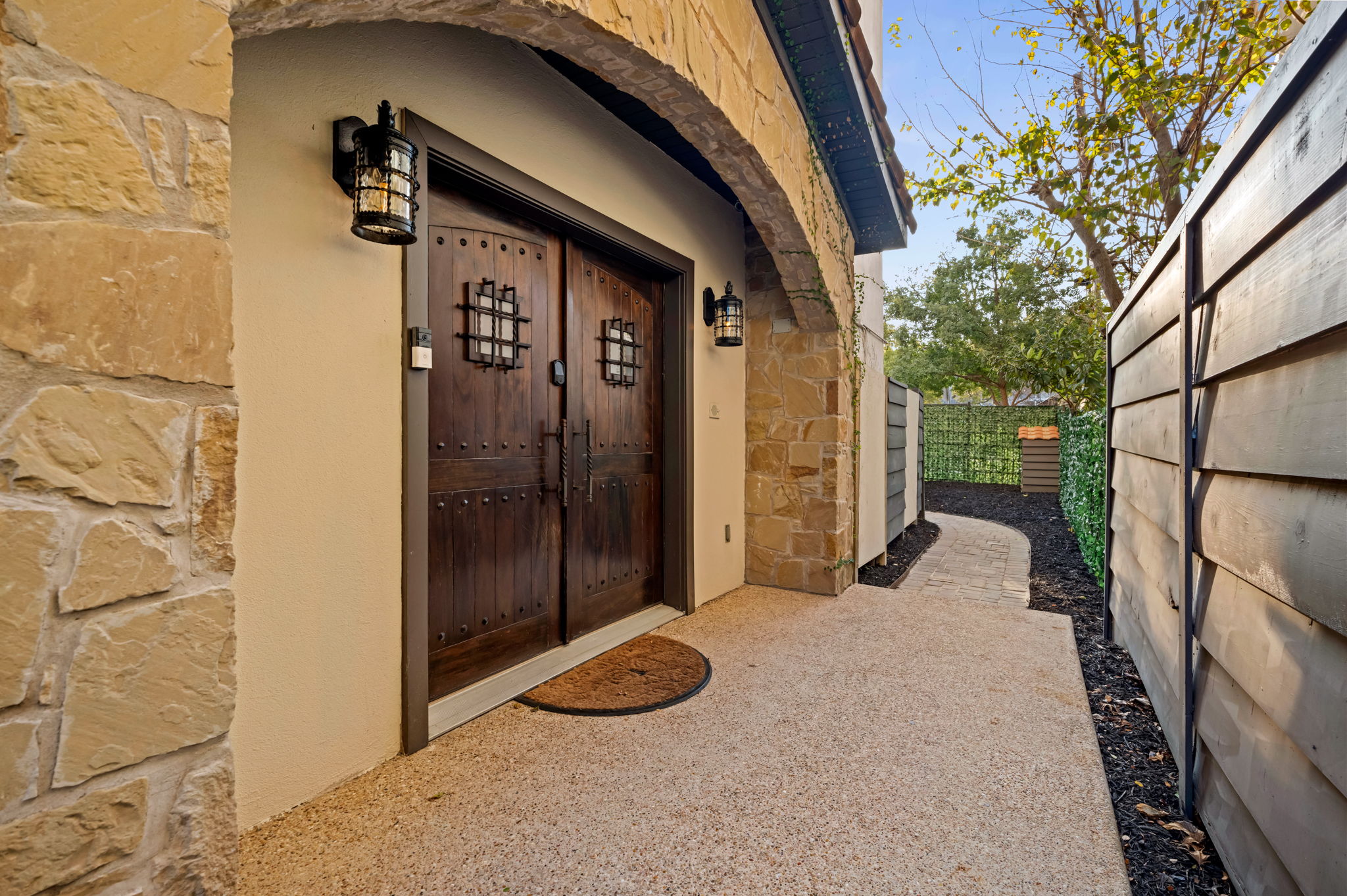 1231 Parkway, Unit 2 Austin, TX 78703 - Photo 8 of 40 a view of a door and chair in the patio