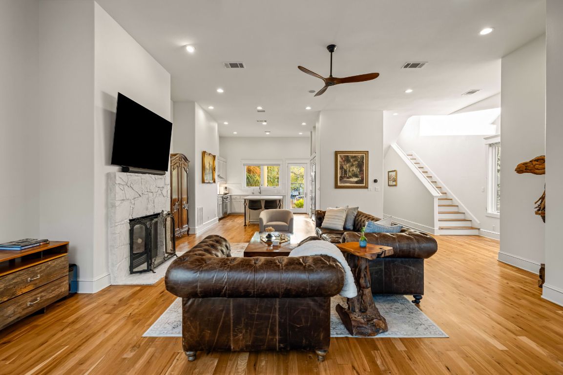 1231 Parkway, Unit 2 Austin, TX 78703 - Photo 10 of 40 Roomy living area with cozy fireplace