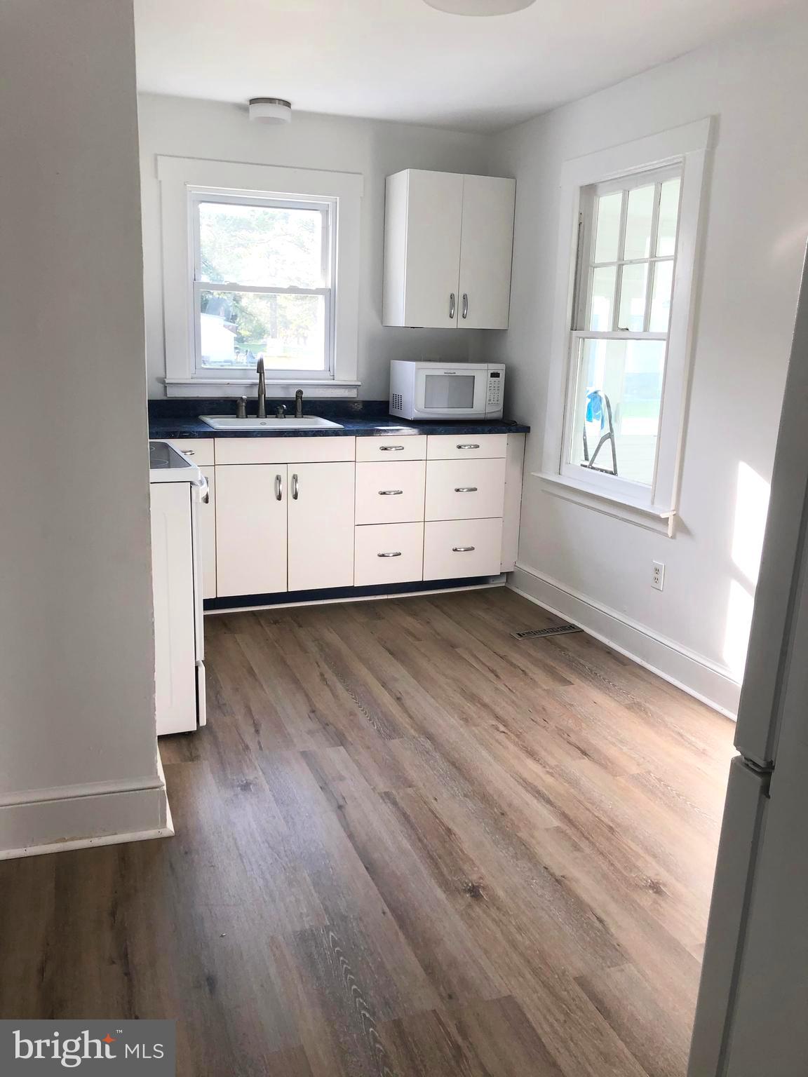 38150 Beach Road Coltons Point, MD 20626 - Photo 11 of 32 New flooring throughout the kitchen
