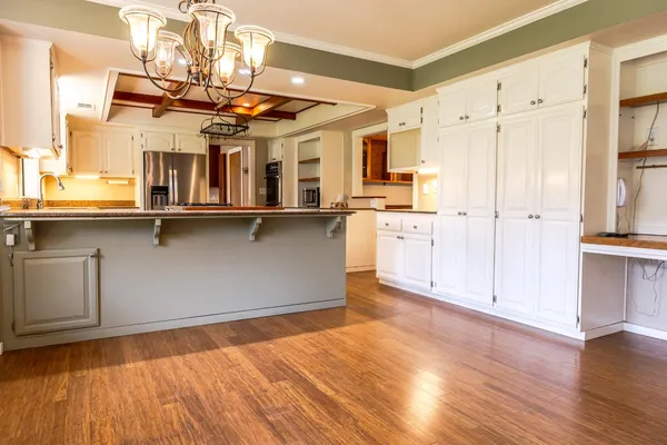 a view of empty room with ceiling fan