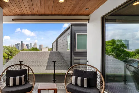 a outdoor living space with furniture and a window