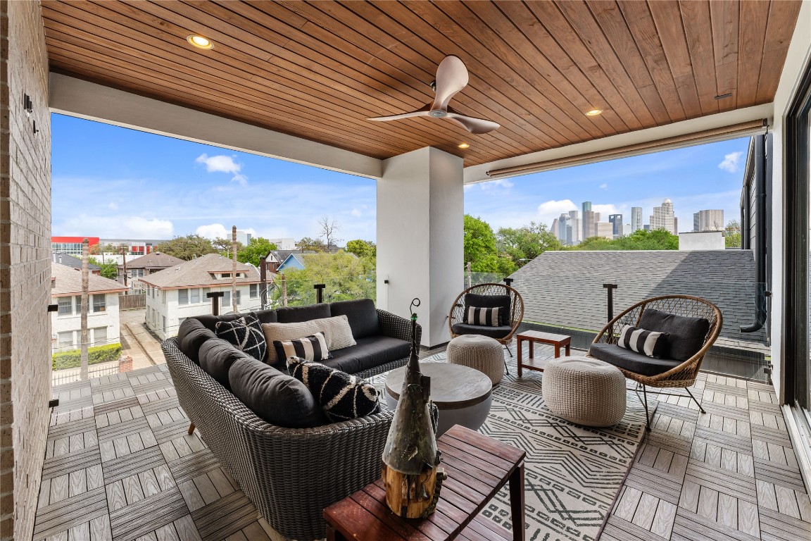 917 Peden Street Houston, TX 77006 - Photo 42 of 50 Enjoy captivating views of the Houston skyline from this elevated outdoor living space. The open design frames the cityscape while maintaining a sense of privacy. A perfect setting for morning coffee or evening gatherings.