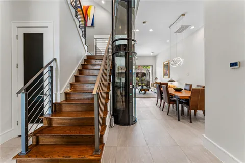 a view of kitchen island with furniture and wooden floor