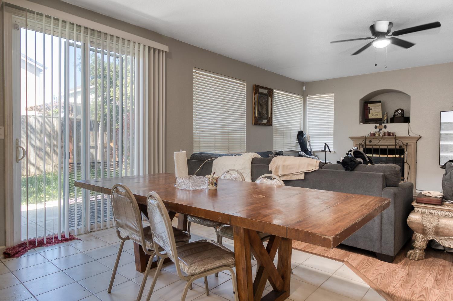 6282 Crestview Circle Stockton, CA 95219 - Photo 10 of 22 a view of a dining room with furniture and window