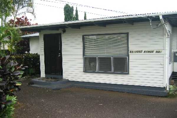 82-1052 Kinue Road Captain Cook, HI 96704 - Photo 1 of 9 a view of a house with a garage