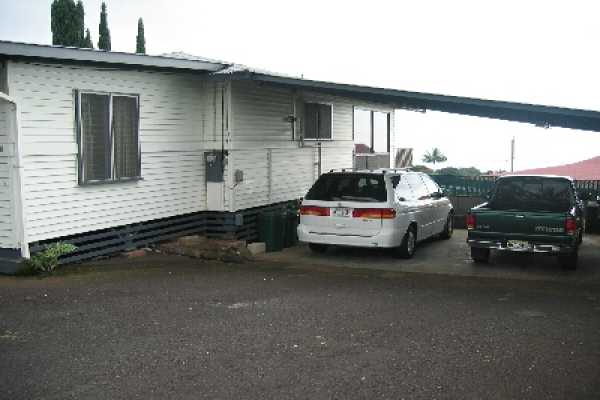 82-1052 Kinue Road Captain Cook, HI 96704 - Photo 2 of 9 a car parked in front of a house