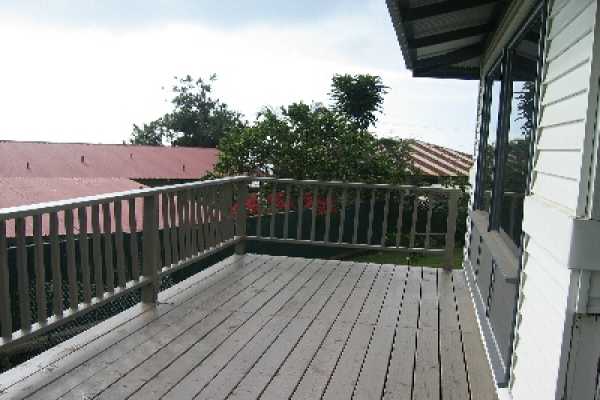 82-1052 Kinue Road Captain Cook, HI 96704 - Photo 6 of 9 a balcony with wooden floor