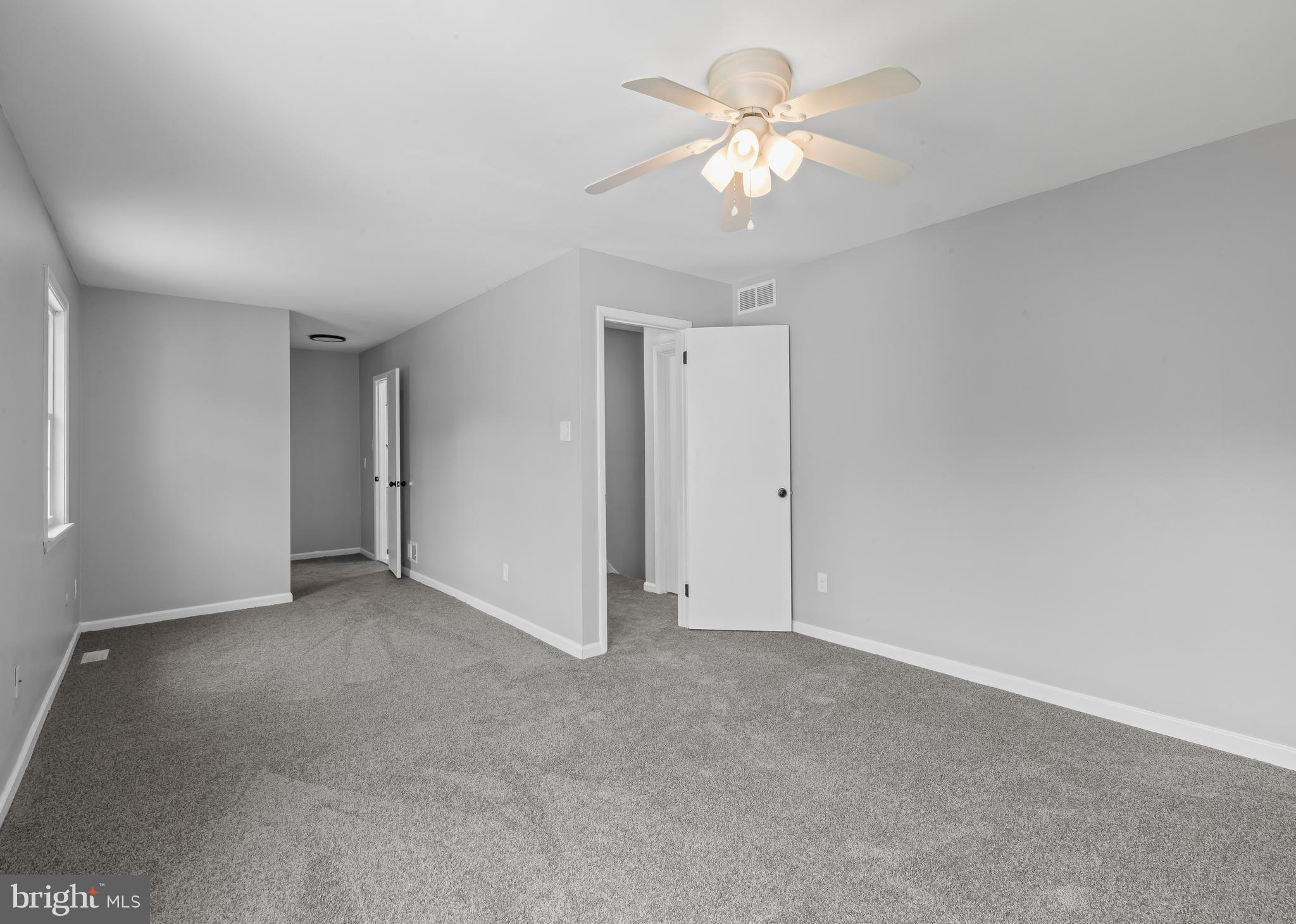 6 Heron Place Clementon, NJ 08021 - Photo 21 of 29 a view of an empty room with a chandelier fan